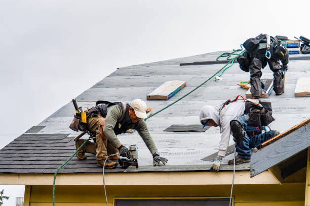 Professional Roofing technician working in Wauregan, CT